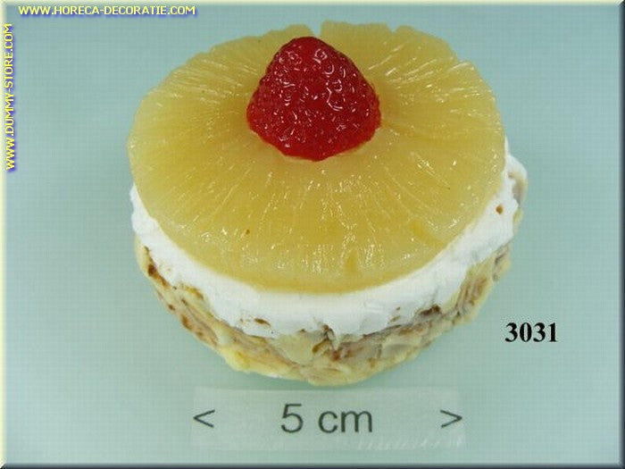 Cake with pineapple slice, strawberry and whipped cream - imitation
