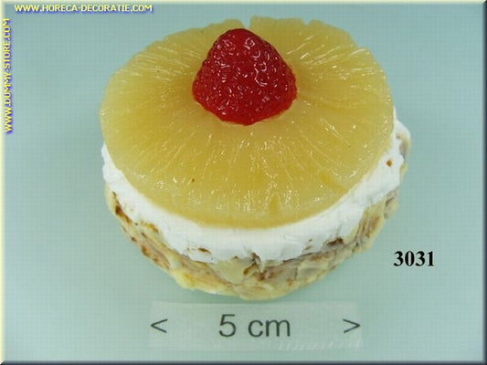 Cake with pineapple slice, strawberry and whipped cream - imitation